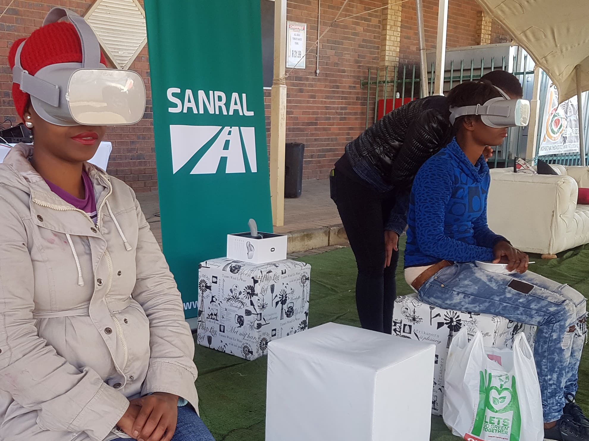 Participant wearing Oculus Go at SANRAL stand