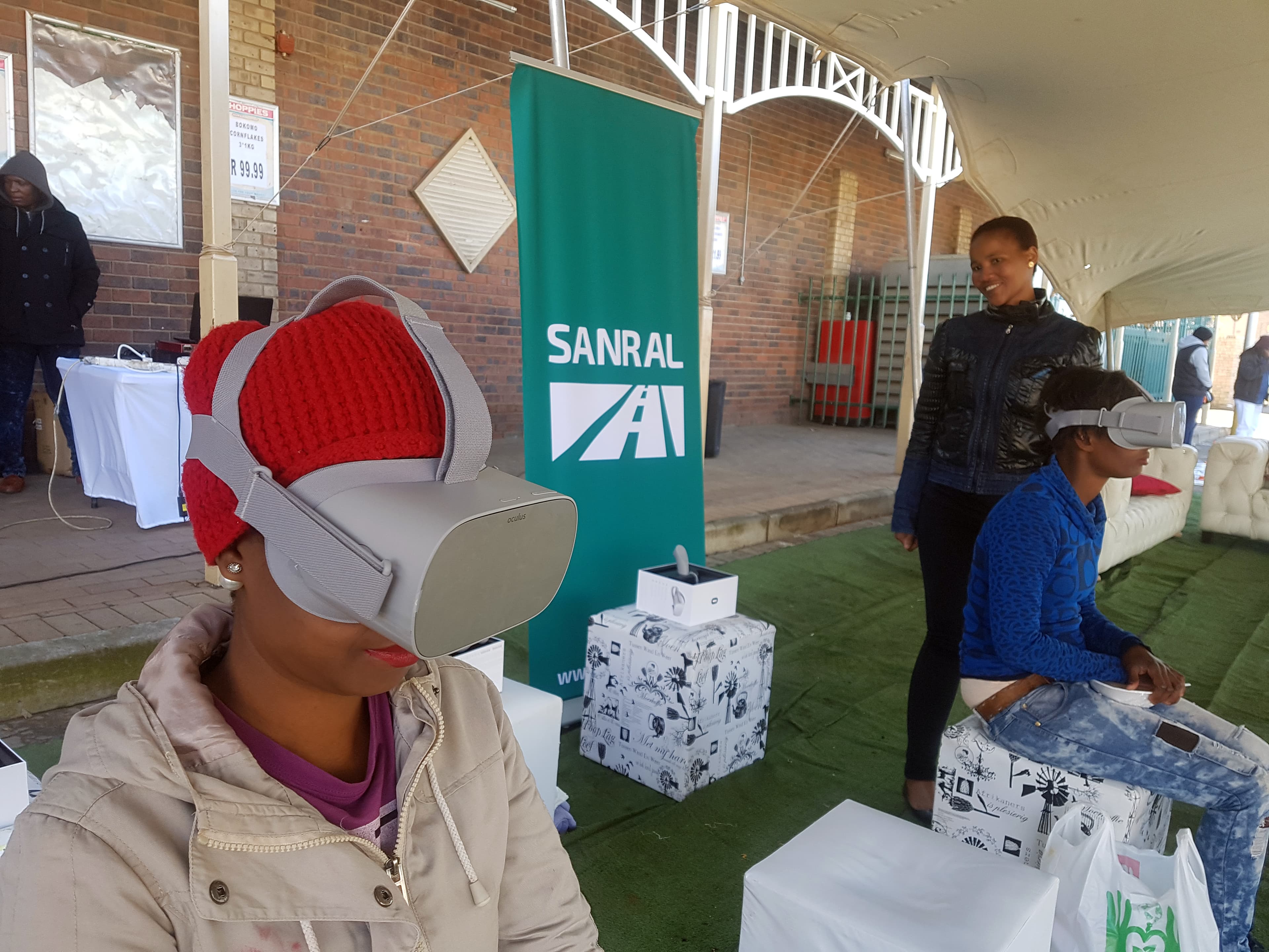 Local community members lining up for the VR headset