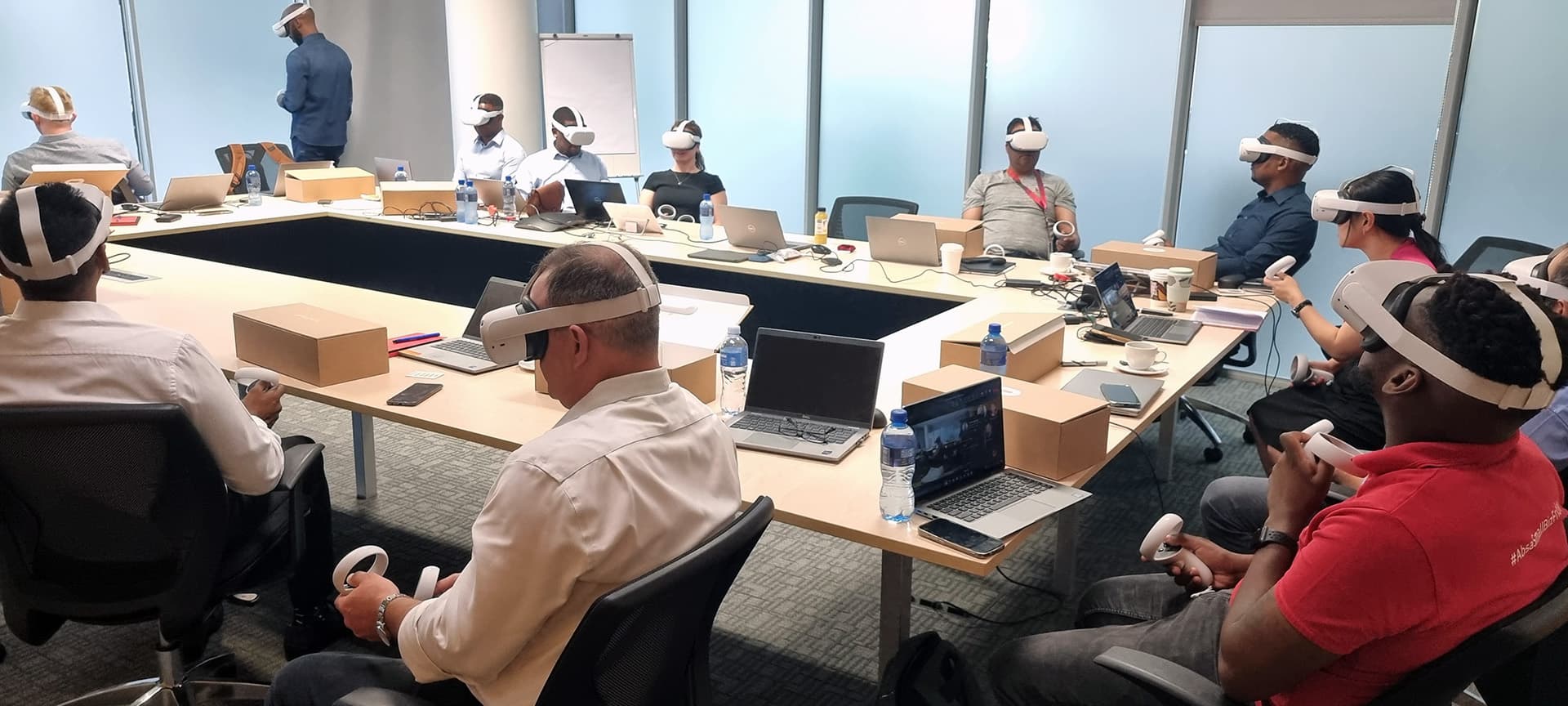 People collaborating in virtual reality with VR headsets