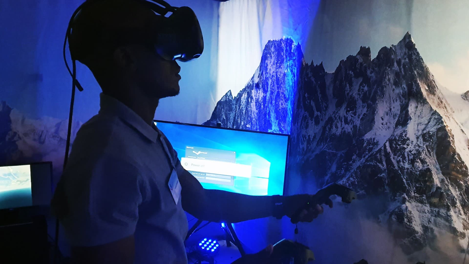 Attendee exploring ice crevasses and ladders in the Everest VR environment