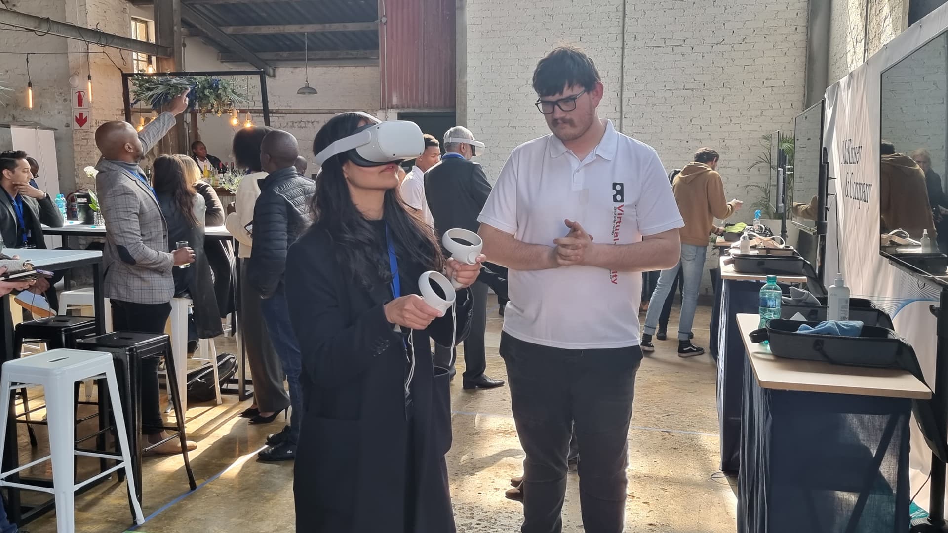 Delegates exploring interactive 3D spatial stages in the metaverse