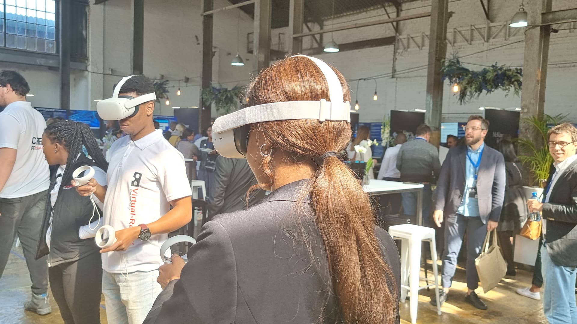 A guest exploring a virtual reality experience through a headset