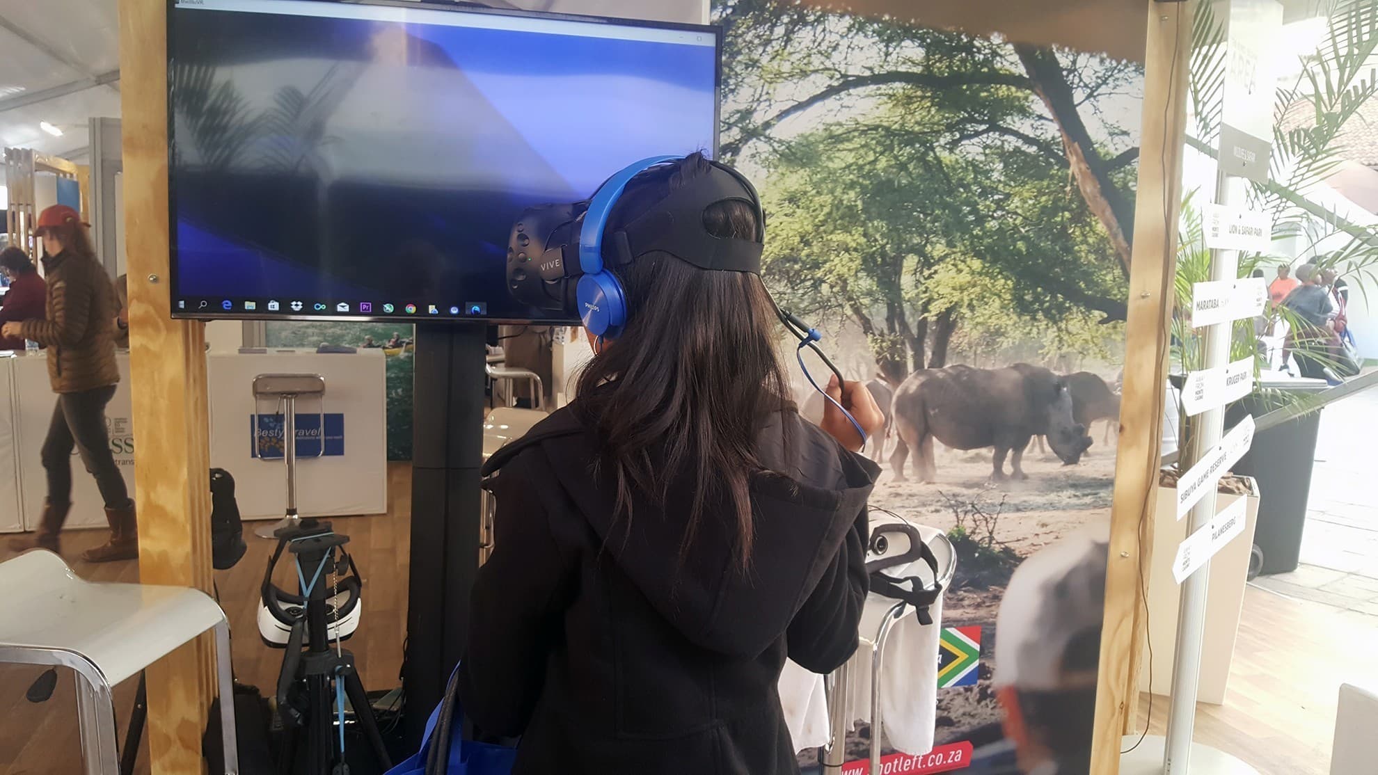 A VR event station with a television for audience viewing