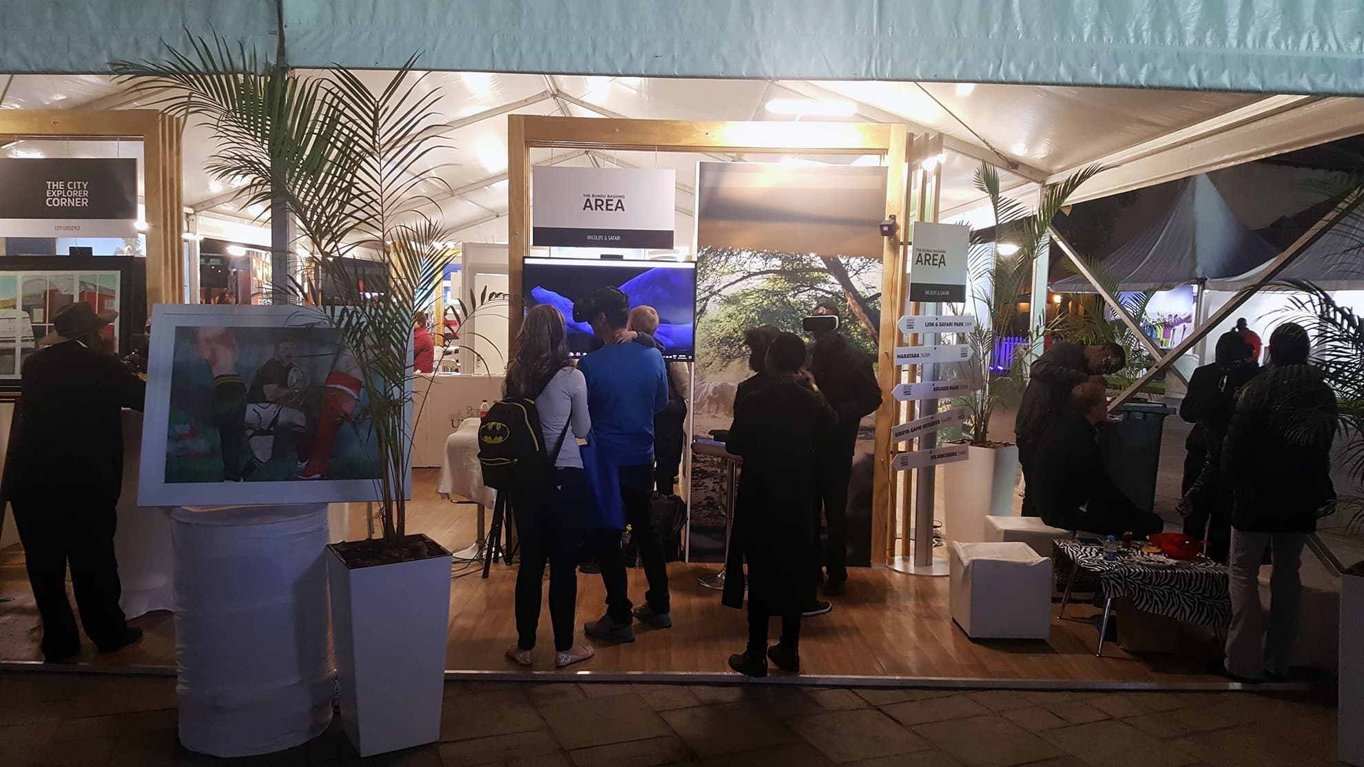 Attendees engaging with the South African Tourism VR stand