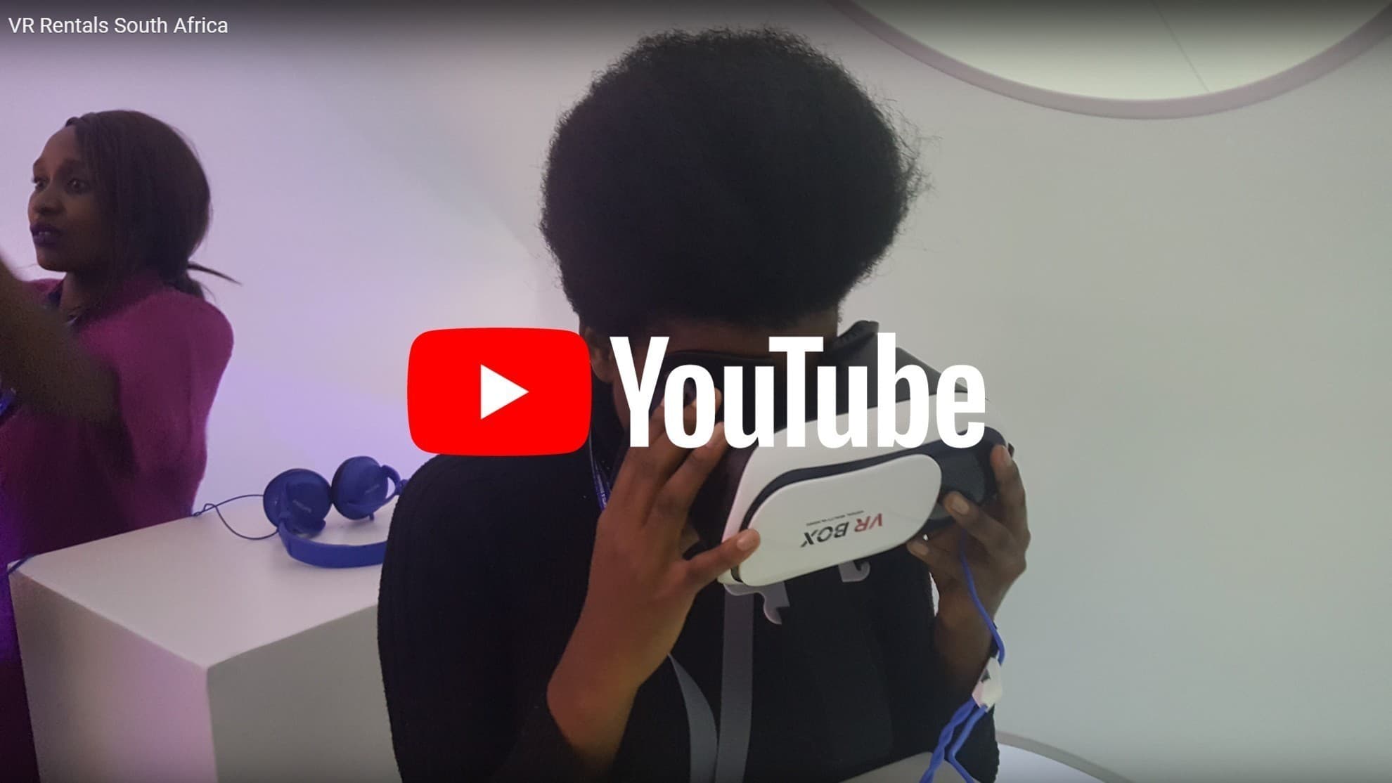Visitors using virtual reality headsets at an event