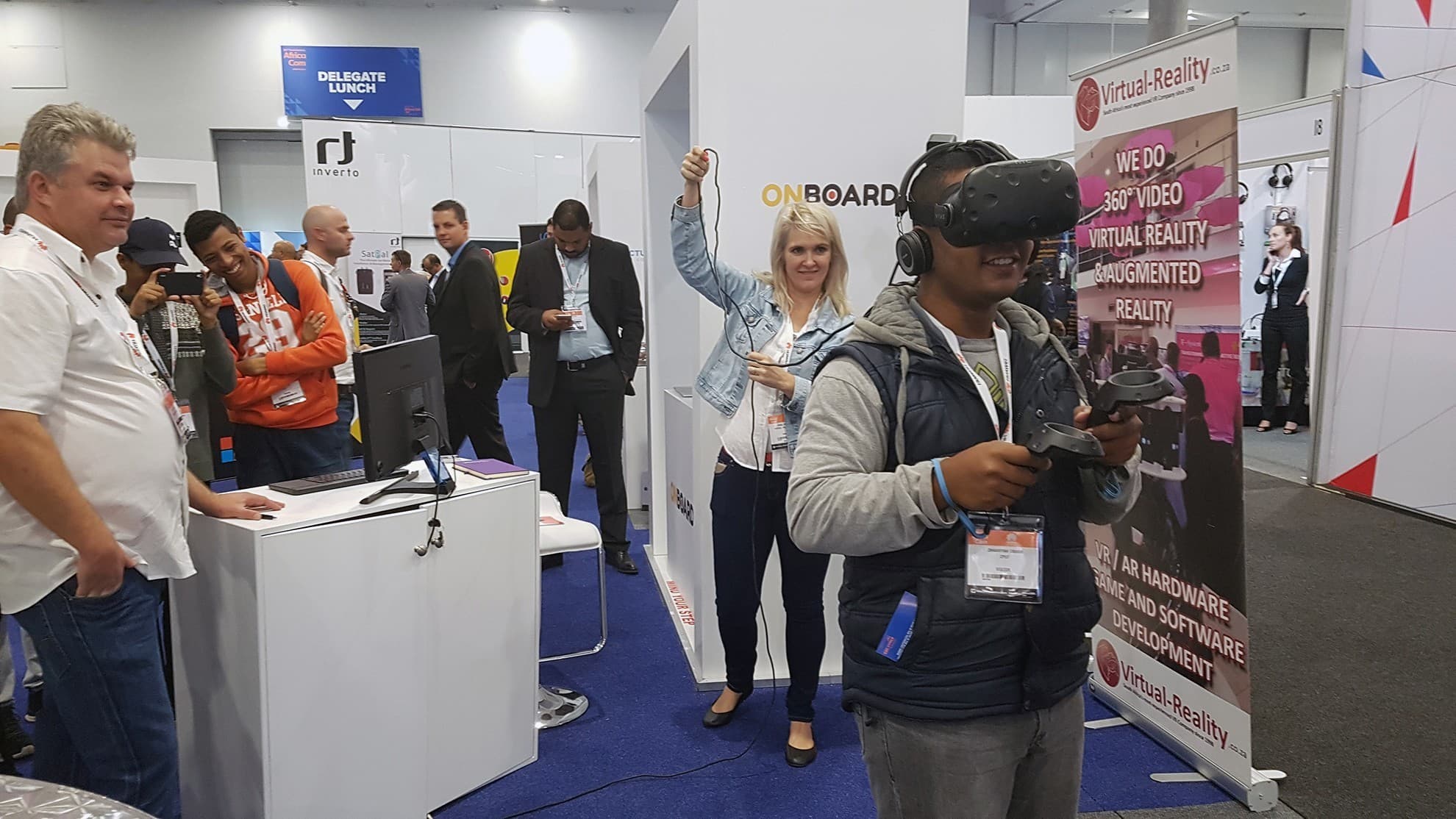 A visitor wearing an HTC Vive headset during a VR activation