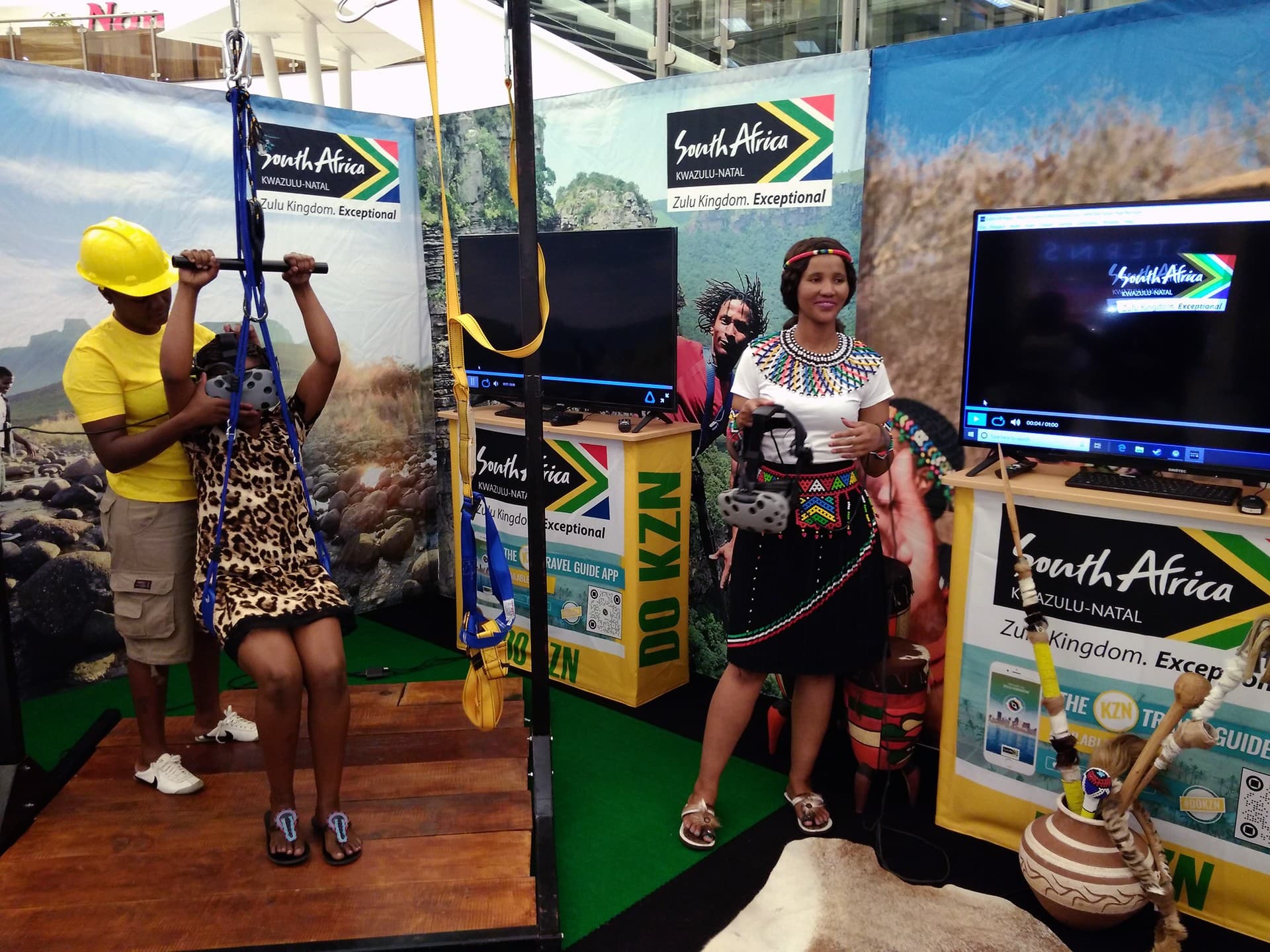 Guests trying a VR experience at a Tourism KwaZulu-Natal exhibition stand
