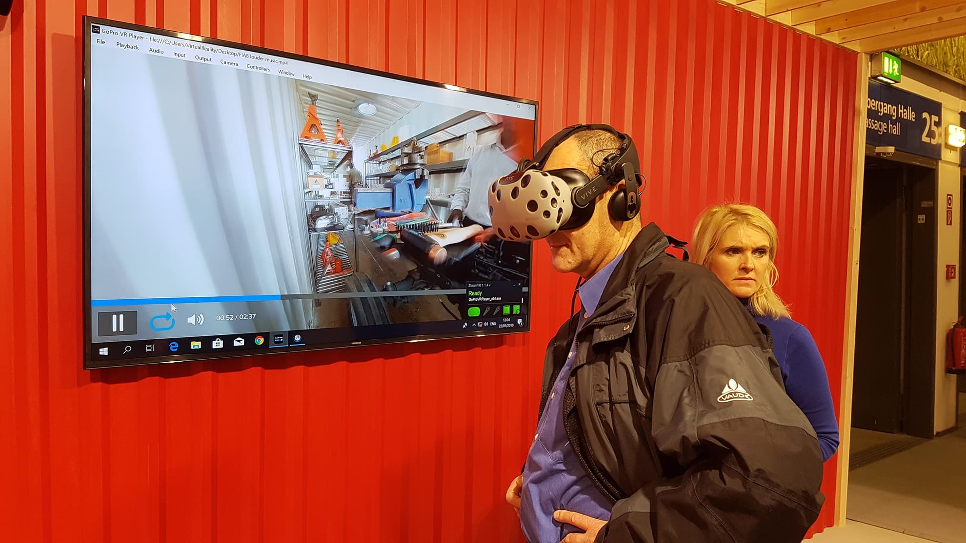 A participant wearing a VR headset at a product demonstration
