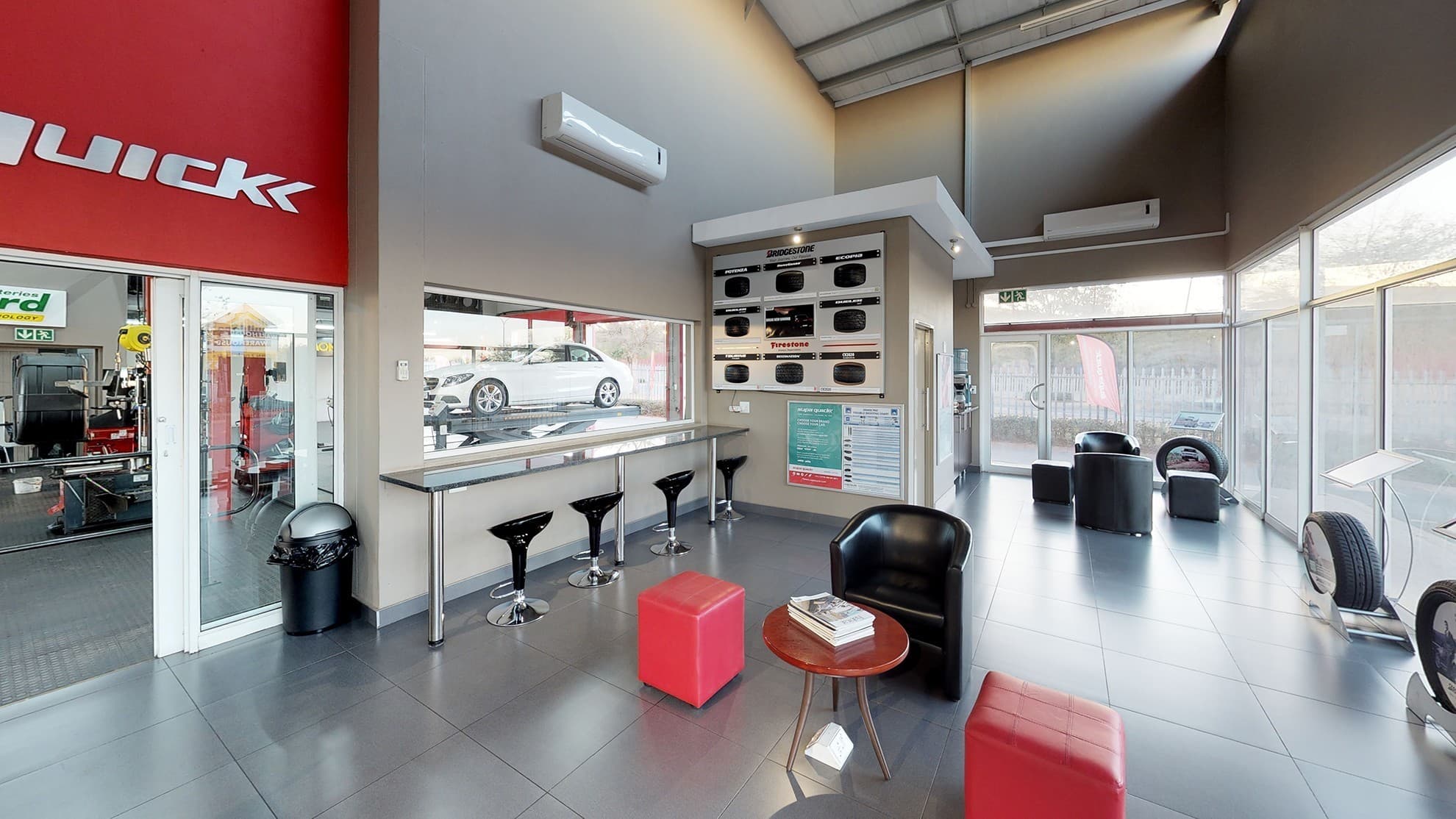 A panoramic view inside an automotive showroom