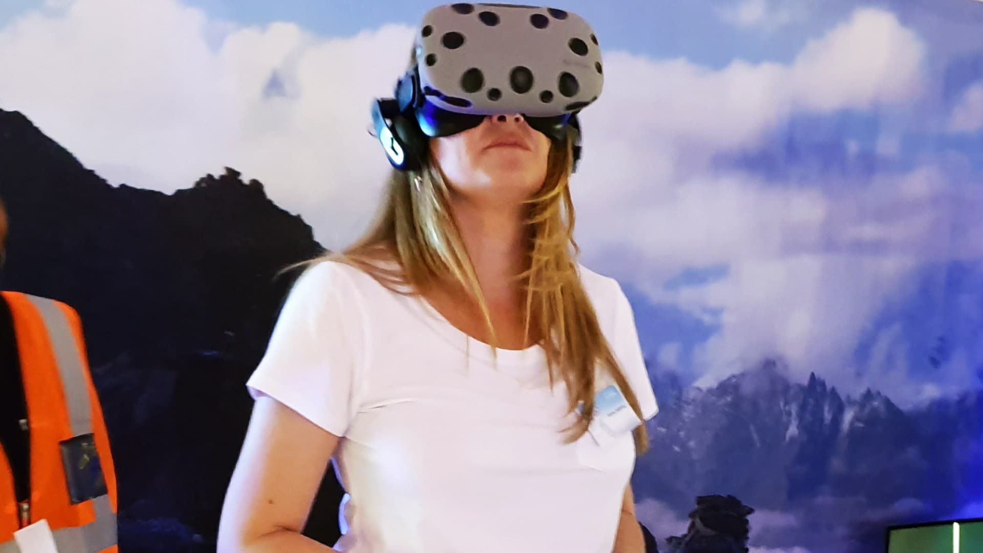 Guest reacting to the panoramic vista from the summit of Mount Everest