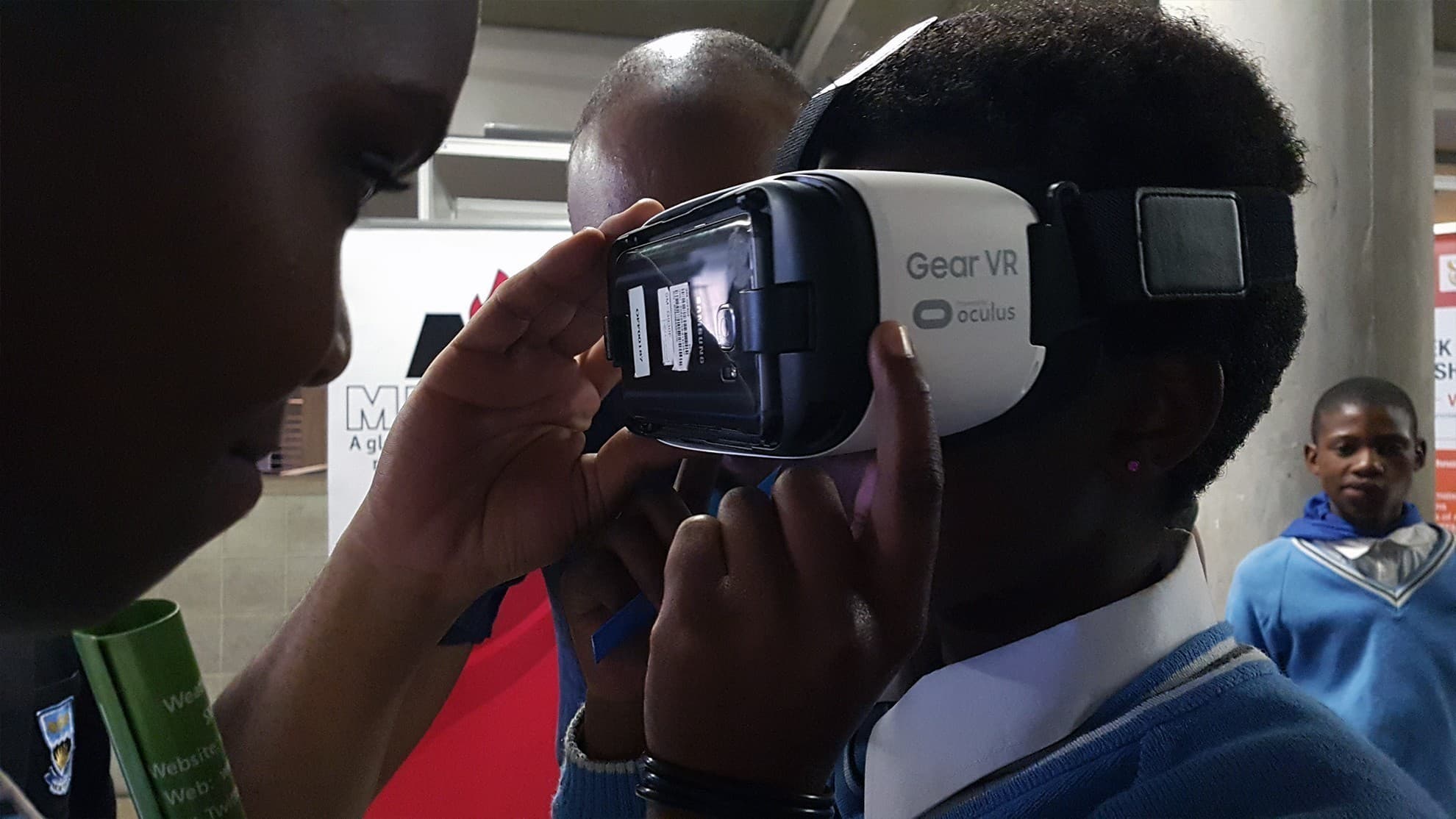 Guest using a phone-mounted Gear VR headset