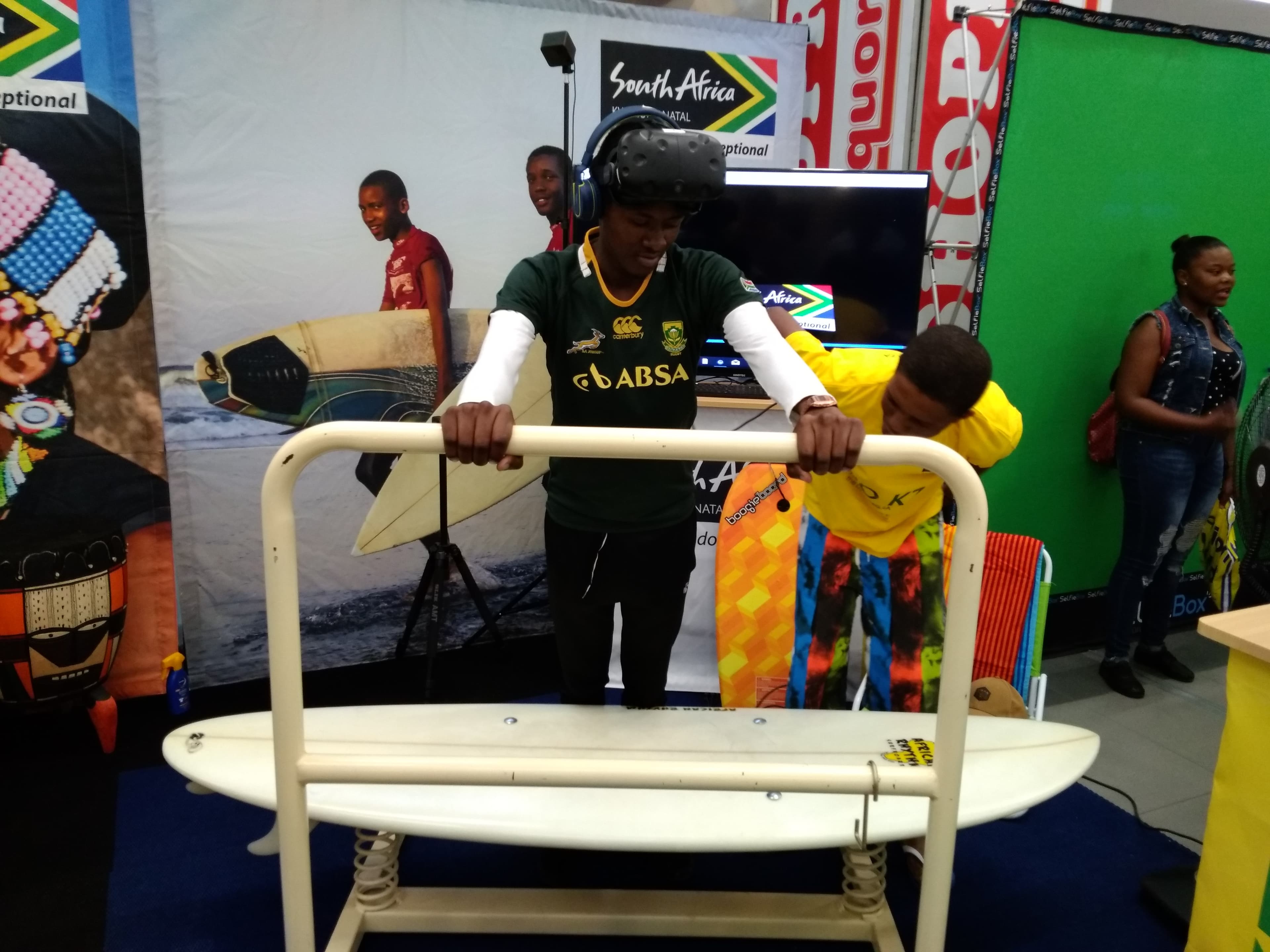 Spring-loaded Durban surfing VR simulator in action