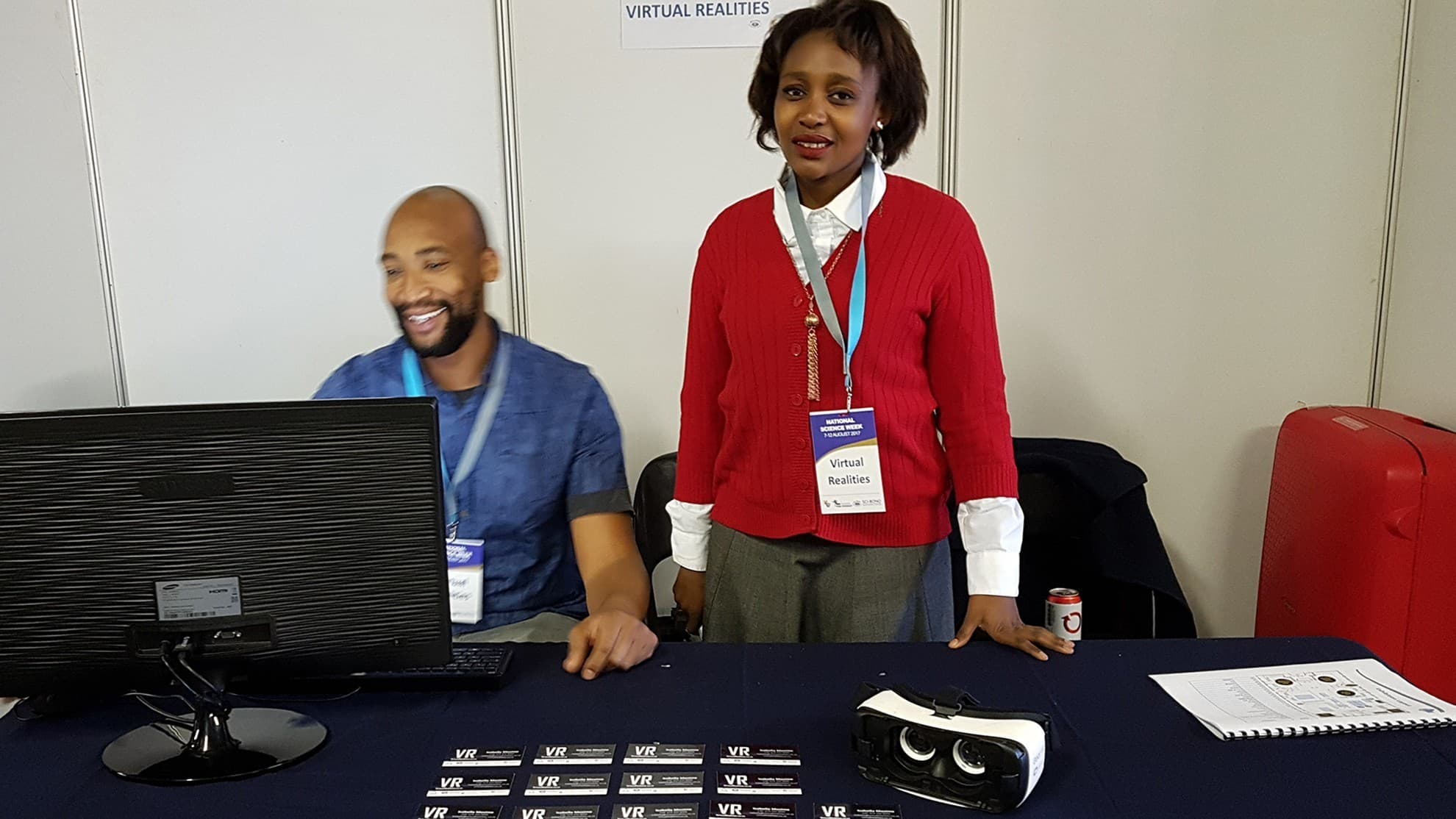 Event team preparing phones and VR equipment