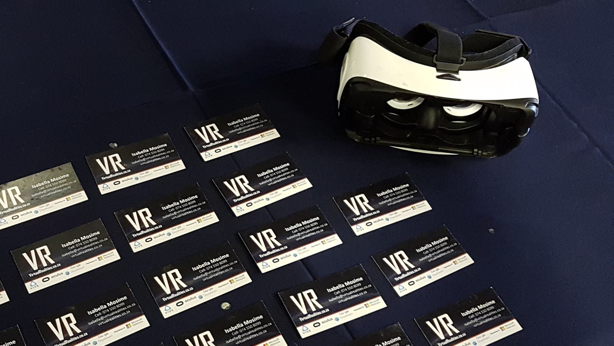 A Gear VR headset displayed alongside event cards