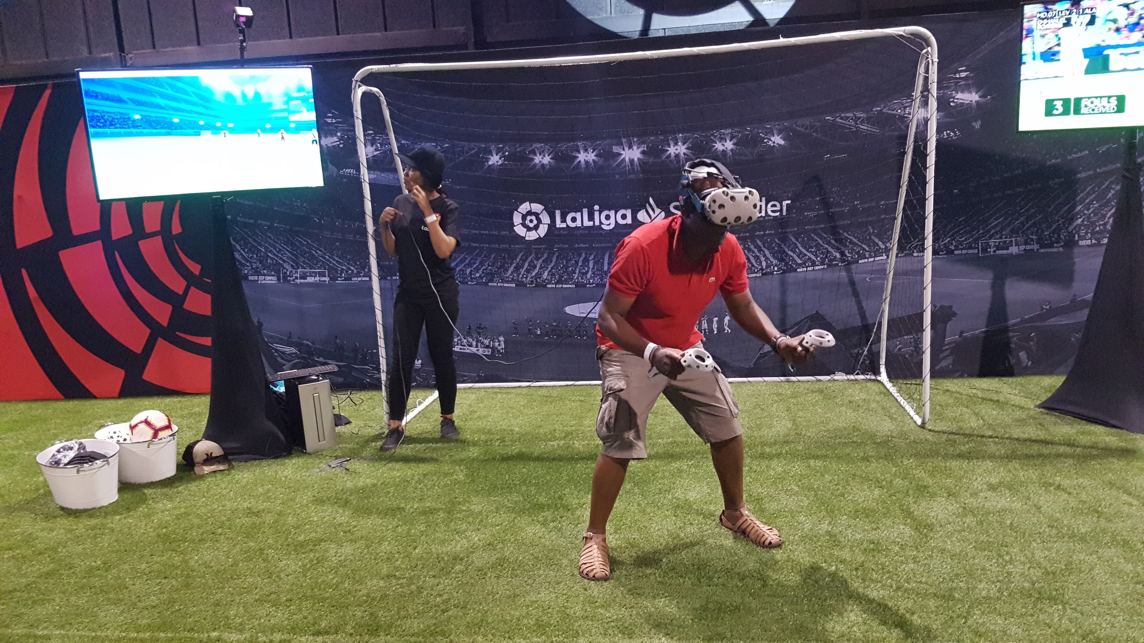 Crowd watching virtual reality soccer game at Nasrec